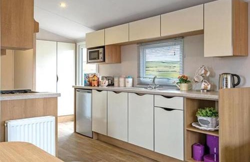 Kinmel Bay House | Six Berth- Pet Friendly please ask Free WiFi Private secure decking - Sea front with amazing views Not to be missed