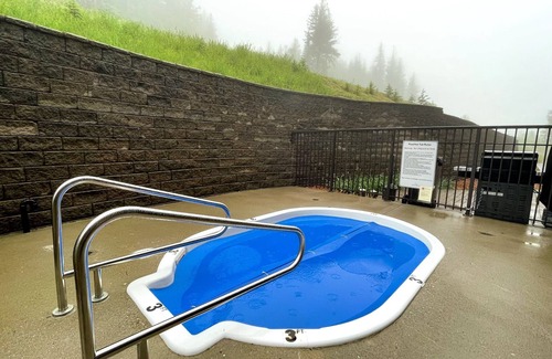 Golden Condo | Ski in/out with brand new hot tub. Top floor Palliser Lodge.