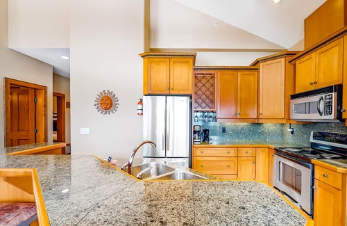 Big White Ski Resort House | Ski-in/ski-out townhouse right next to lifts - private hot tub, fast WiFi & W/D