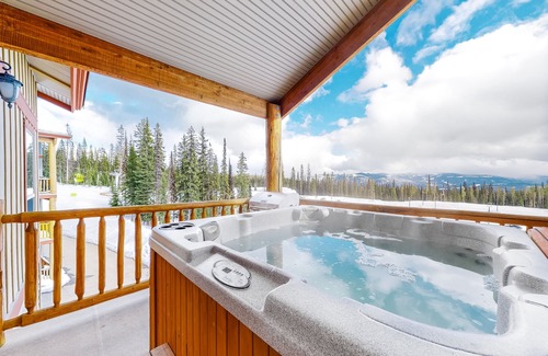 Big White Ski Resort House | Ski-in/ski-out townhouse right next to lifts - private hot tub, fast WiFi & W/D