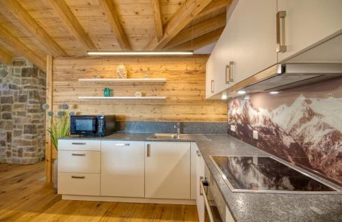 Kaprun House | Ski-in Ski-out Chalet Maiskogel 13A - by Alpen Apartments