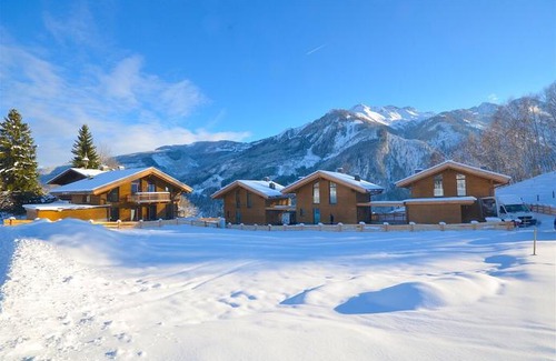 Kaprun Ski Chalet | Ski-in / Ski-out Chalet Maiskogel 13a by Alpen Apartments