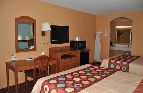 Western Division House | Sky Palace Inn & Suites By Jasper Laredo- Deluxe 2 Queen Bed Non Smoking