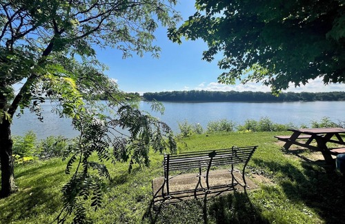 Aurora Condo | SKY Parlor sunrise and sunset views overlooking the river