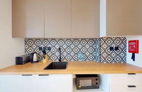 Jumeirah Village Triangle Apartment | Skyline Views: Sunset Studio with Balcony