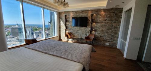 Maakri Apartment | Skyview Suite - Breathtaking Views From Bed and From Jacuzzi. City Center Skyscraper Upper Floors