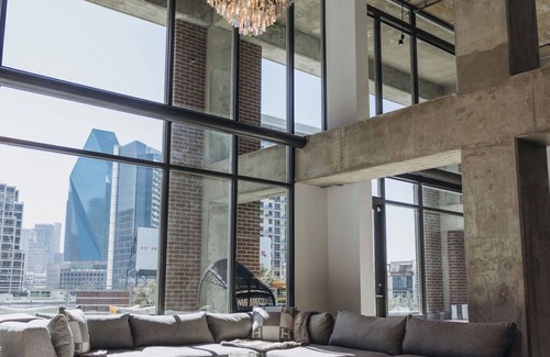 Uptown Condo | Sleek and Spacious Executive Loft with Full Bar, Theater Room, Fitness Room