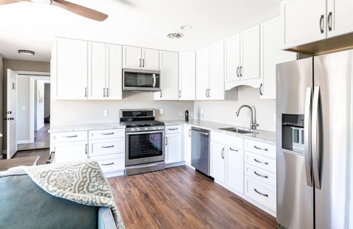 Essex Junction Apartment | Sleeps 12: Apt & 3 rooms with common area and deck