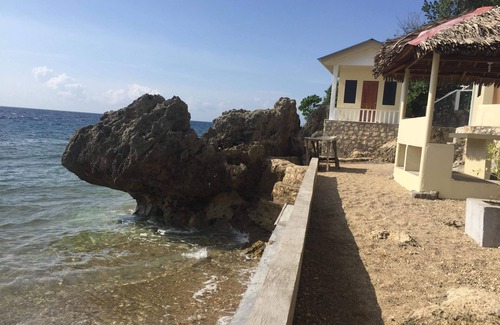 Catmon House | Small houses in a private beach