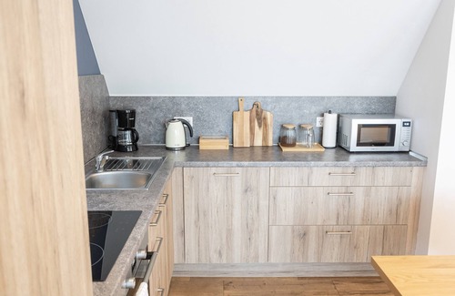 Bad Zwischenahn Apartment | SmartFewo: Himmelsträumer | Penthouse | Sauna