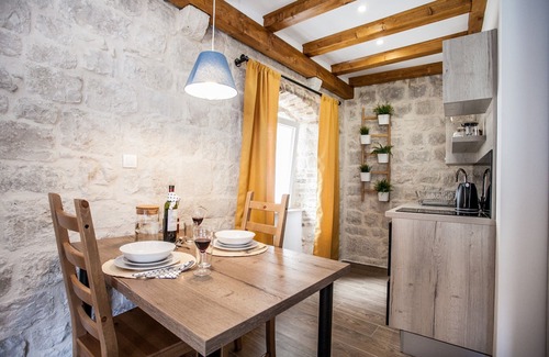 Trogir House | Smooth Marble and Rustic Stone at a Ciovo Island Townhouse