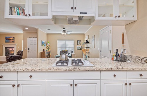 Bass Lake House | Snowbird-friendly retreat hot tub, pool, creek views ,wifi, grill, & fireplace