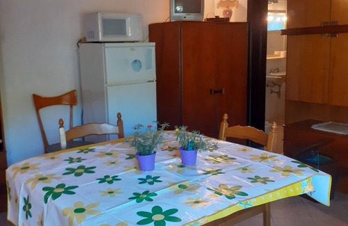 Solanas Apartment | Solanas, large double room with sea and beach views