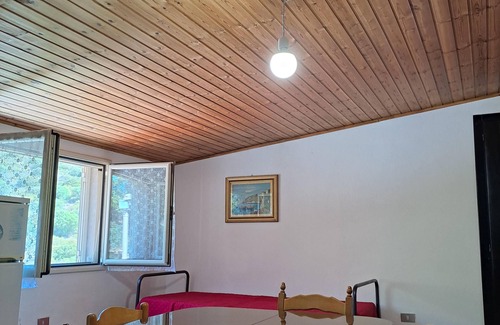 Solanas Apartment | Solanas, large double room with sea and beach views