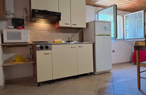 Solanas Apartment | Solanas, large double room with sea and beach views