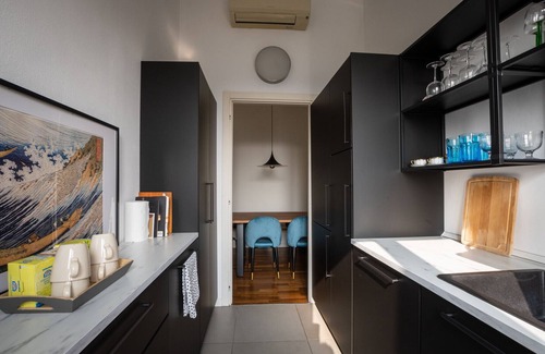 Giambellino Apartment | Solari Design Attic | Design District