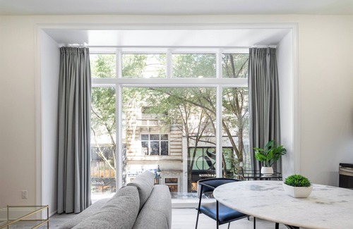 Rittenhouse Row Apartment | Sosuite | Penthouse 1BR Apt w Arch Windows, W/D