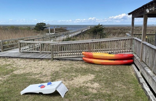 Salvo Cottage | Soundfront Sunsets with Private Dock, Kayaks, Large Pool, Hot Tub, Guesthouse