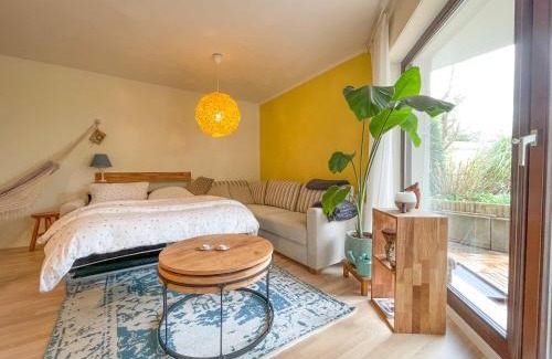 Niederzwehren Apartment | Souterrainwohnung mit großem Garten und Sauna