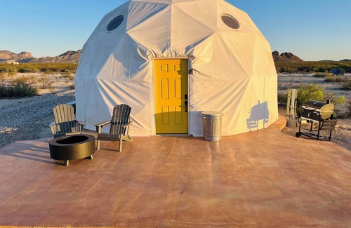 Terlingua RV Rental | Southern Boho inspired Geodesic Dome nestled up next to Big Bend National Park.