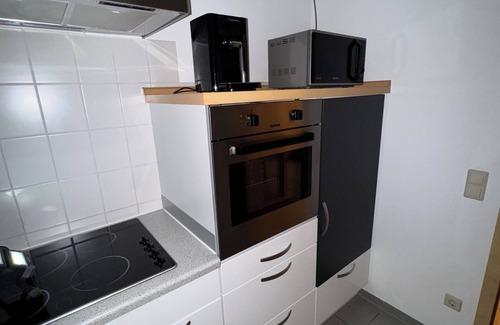 Herxheim Apartment | Spacious vacation apartment with a beautiful covered terrace in a huge garden.