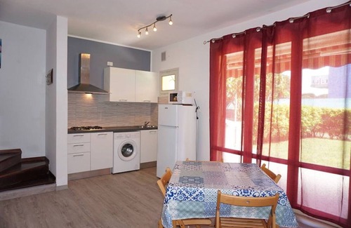 Porto Santa Margherita Villa | Spacious villa with private garden and shared pool