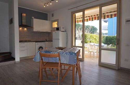 Porto Santa Margherita Villa | Spacious villa with private garden and shared pool