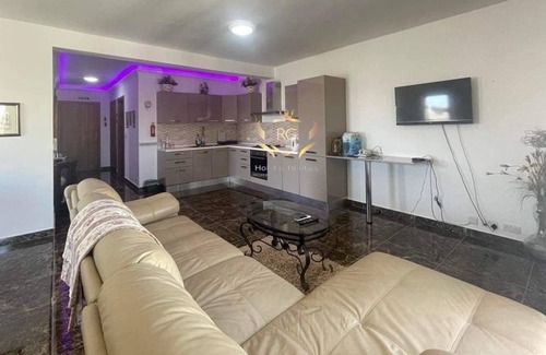 Birzebbuga Apartment | Spacious 2 bedroom, open plan apartment with a terrace (sleeps 6)
