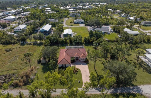Pine Island Center House | Spacious 3-Bedroom Bokeelia Oasis w/Large Saltwater Pool & Outdoor Fire Pit