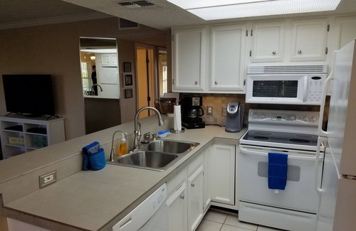 South Padre Island Condo | Spacious 3rd Floor Condo - Minutes from Beach or Bay - with shared Pool!