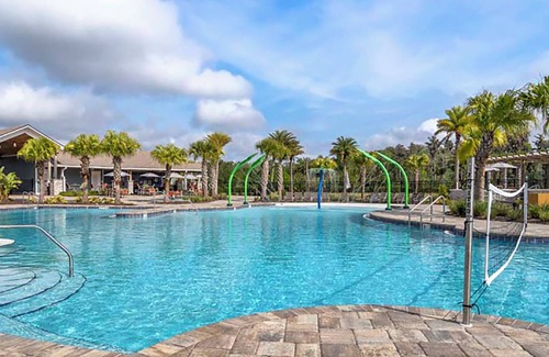 Orlando House | Spacious 4-bed townhome with AC. Beautiful resort style pool and fitness center