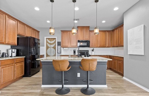 Hutto House | Spacious 4-bedroom Round Rock home with an open floor plan, Smart TVs in every room, and high-speed internet. Pet-friendly and conveniently close to Kalahari Resort and Dell Diamond, this modern yet cozy retreat is perfect for families & long stays.