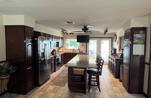 Azle House | Spacious 4-BR lake front WiFi ,hot tub, EV charger on Eagle Mountain Lake Azle