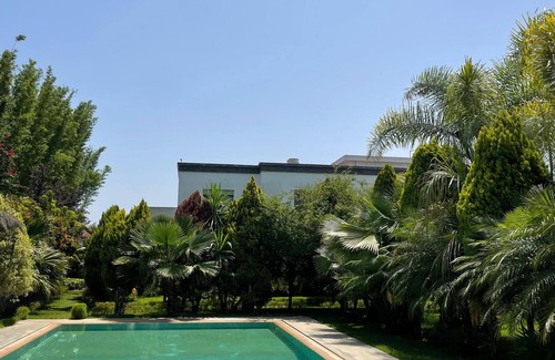 Oulad Slama Villa | Spacious 6-bedroom villa in delightful Kenitra with AC, fitness room, WiFi
