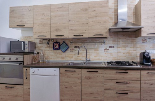 Province of Cagliari Apartment | Spacious apartment within walking distance of the historic center and shopping streets