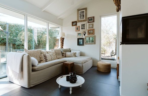 Ouddorp House | Spacious beach style holiday home with large garden and sauna.