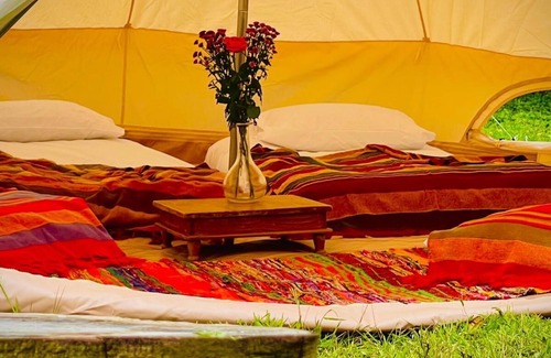 Gilmerton RV Rental | Spacious Bell Tent Nestled in Our Orchard Field at Edinburgh Festival Glamping!