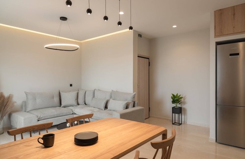 Rethymno Apartment | Spacious deluxe condo on the beach with stunning sea view