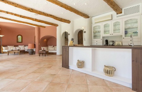 Santa Eulalia del Rio Villa | Spacious villa with a beautiful garden, private pool on the beach of Cala Llenya