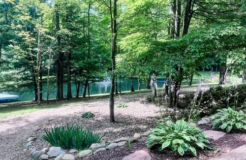 Loudonville House | Spacious, family-friendly lodge on 10 wooded acres. Sleeps 20 with 5 bedrooms, stocked pond