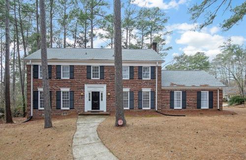 Terry Sanford House | Spacious Family Oasis with Hot Tub & Game Tables