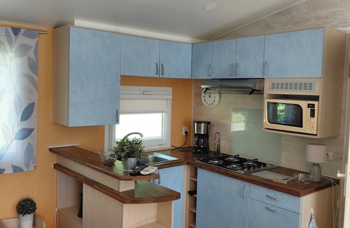 Le Chesne House | Spacious mobile home with terrace and lake view, ideal for families.
