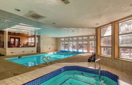 Mountain House Condo | Spacious, ground-level condo with ski views, pool, & hot tub
