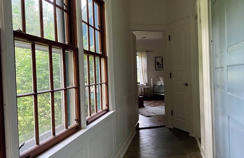 Holcomb House | Spacious Hillside Home Overlooking Private Woods