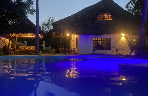 Diani Beach House | Spacious holiday home with private pool and garden.