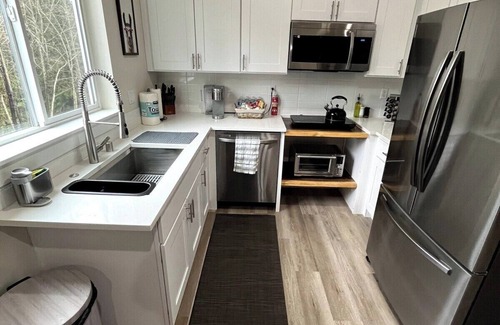 Longview House | Spacious home and lower level condo with outside entrance.