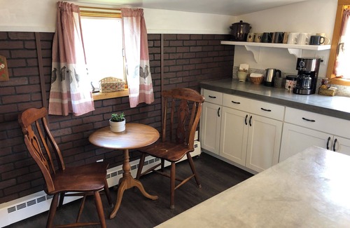 Calumet House | Spacious home with charming lodge feel – In town, one block from trails!
