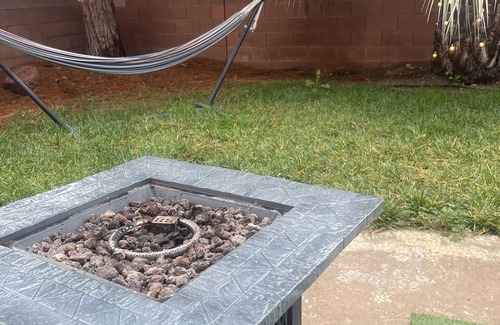 Summerlin House | Spacious home with grass backyard, fire pit, & craft bar!