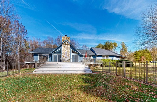 Bumpass House | Spacious house with water view, kayaks, foosball table, deck, firepit