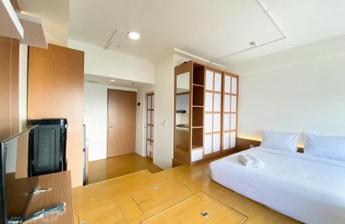 Cikarang Apartment | Spacious Japanese Style Studio Apartment at Vasanta Innopark By Travelio